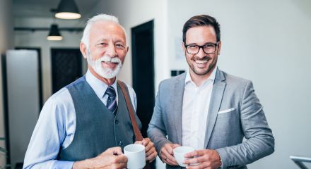 portrait two successful smiling business men scaled 7b2a4294